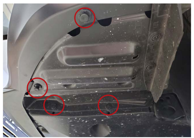Subaru Outback splash guard push rivets indicated for removal