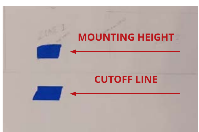 Mounting height and fog light cutoff line marked four inches apart