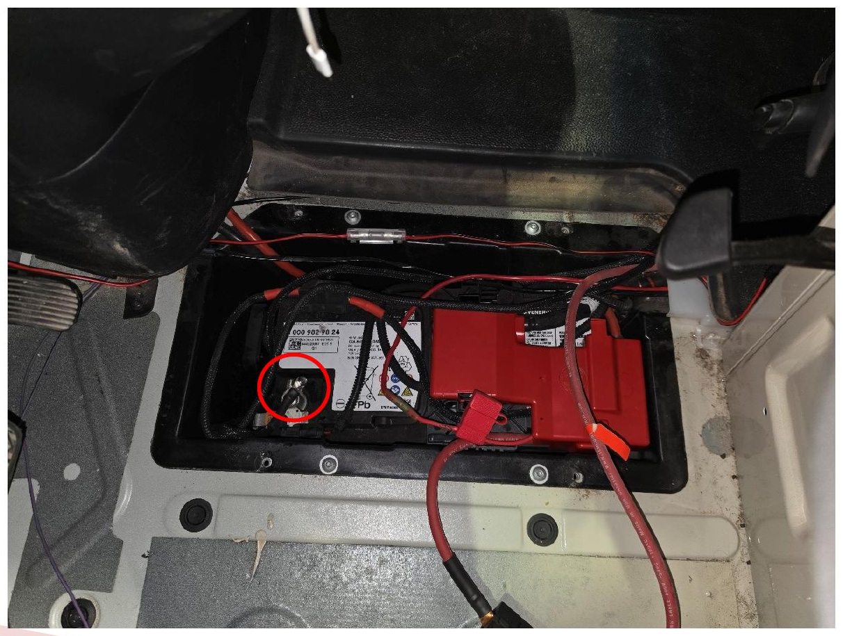 Negative battery terminal marked for disconnection