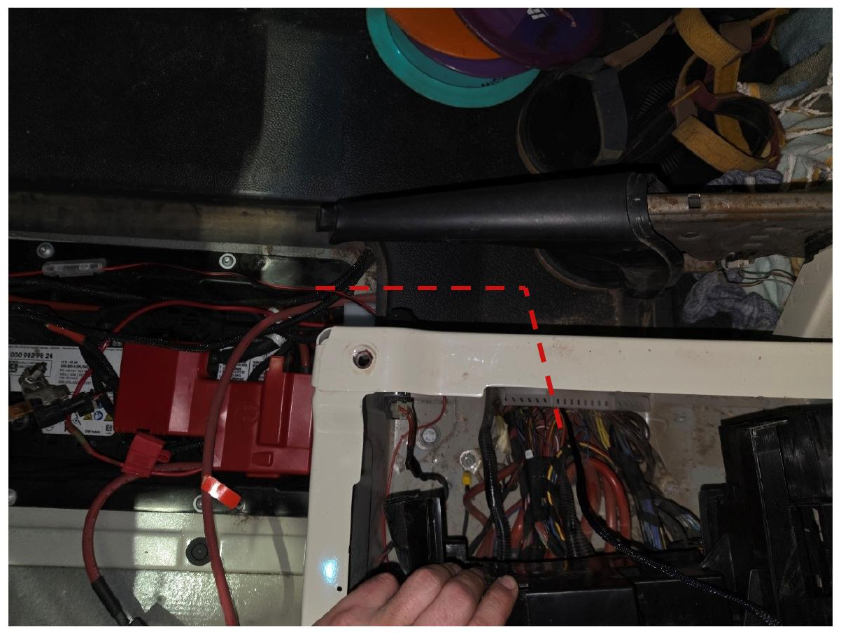 Backlight harness routed through the factory wire tunnel