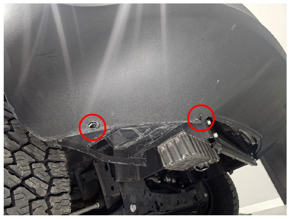 Lower fender liner clips marked for removal