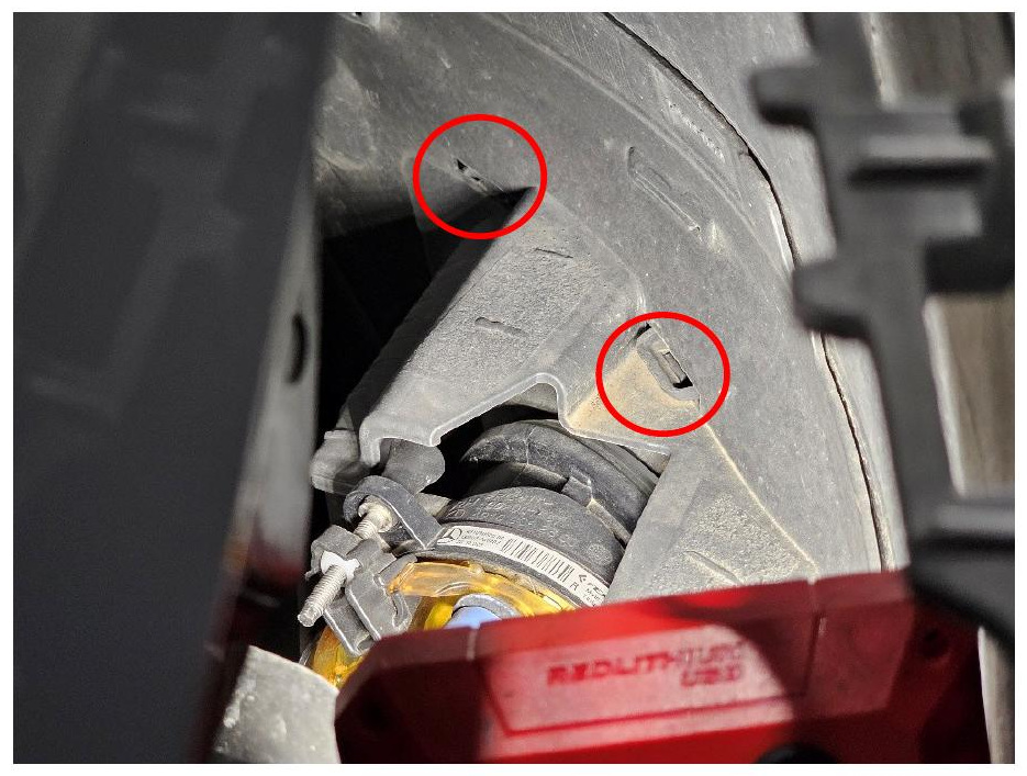 Factory fog light bezel mounting tabs
