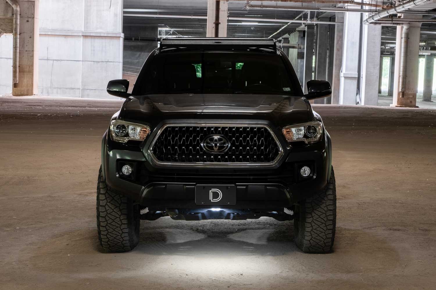 Stage Series LED Rock Lights for Trucks on a Toyota Tacoma in low power mode